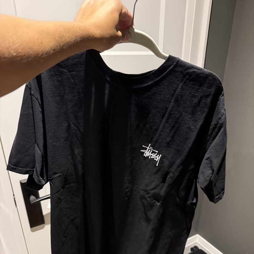 Stüssy Stock Logo Tee — Black (front & back)